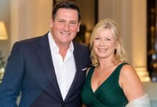 Alison Evers and Tony Hadley posing together at a formal event