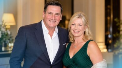 Alison Evers and Tony Hadley posing together at a formal event